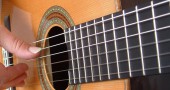Strumming Guitar